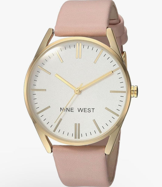 Round Golden Nine West Watch w/ Pink band.