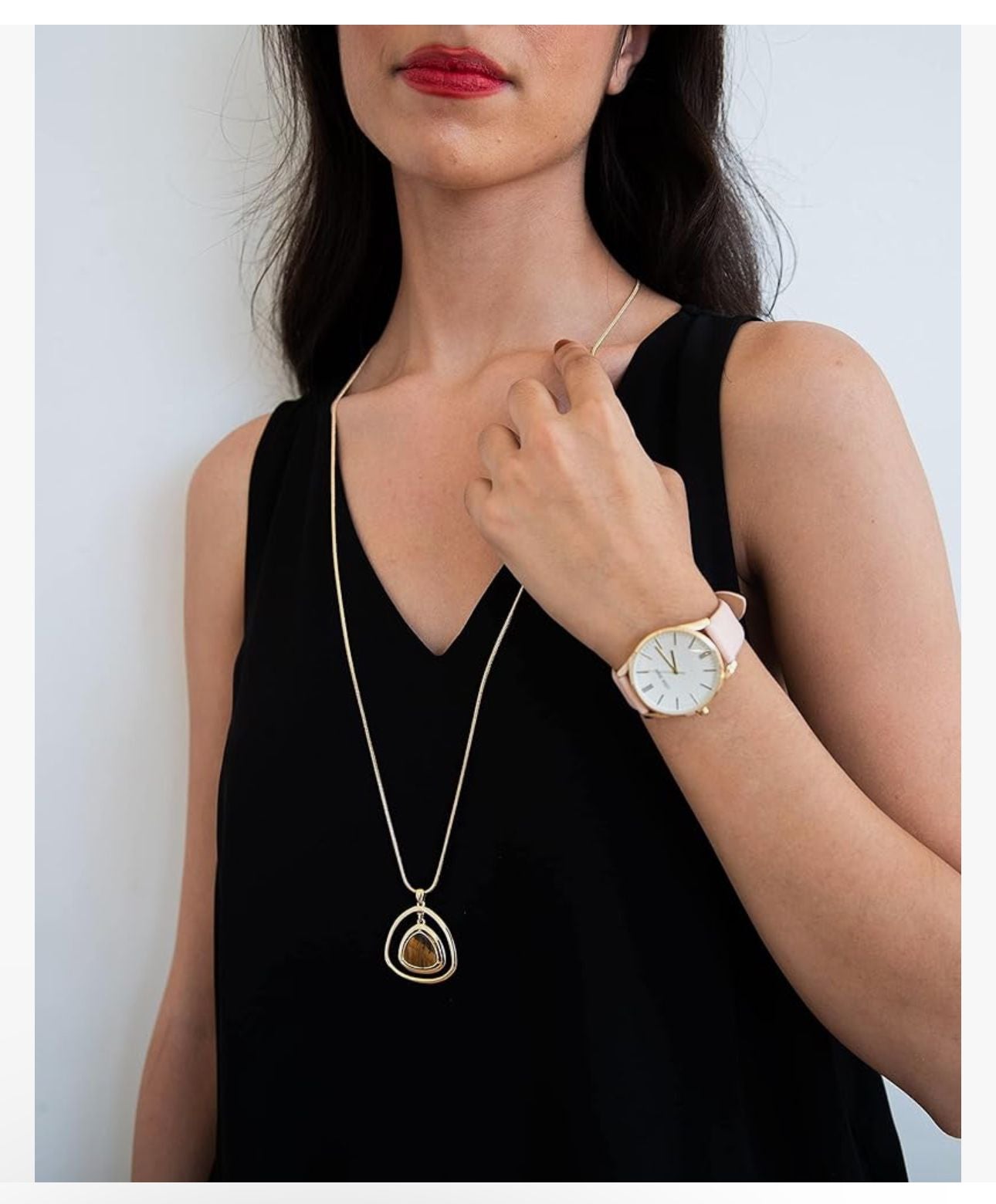 Round Golden Nine West Watch w/ Pink band.